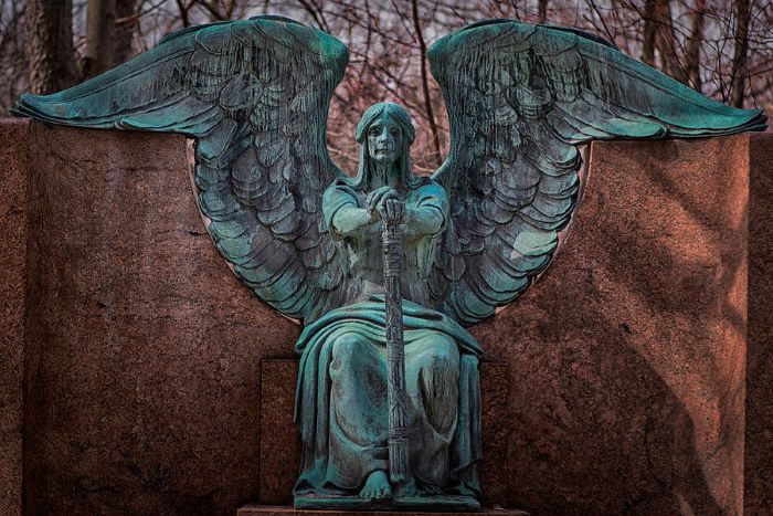 The Angel of Death Victorious is a bronze funerary sculpture with a marble base, created in 1923 by Herman Matzen. It was commissioned by Francis Henry Haserot after his wife's passing and is located in Lake View Cemetery, Cleveland Heights, Ohio. The photograph was taken by Rosette Doyle.